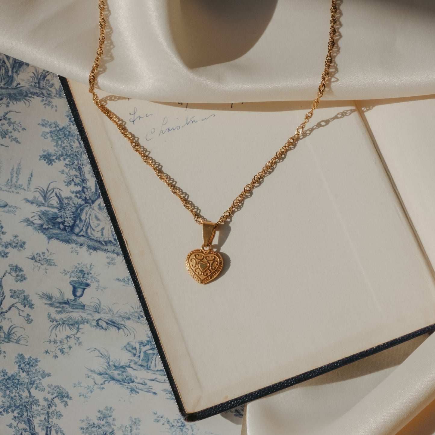 juliet capulet gold heart necklace by london bookish jewellery brand Avery Faye